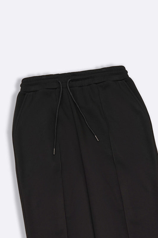 PLEATED NEOPRENE TROUSERS